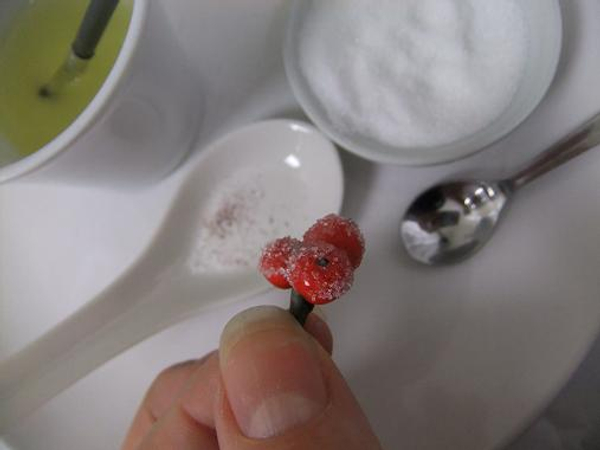 Dip the berries in the sugar