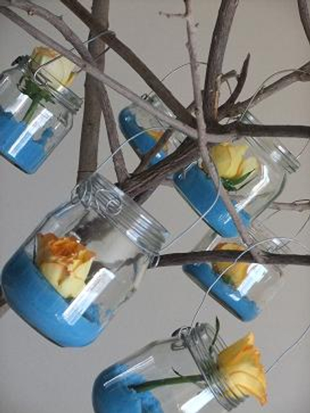 Hanging ball jars on a branch