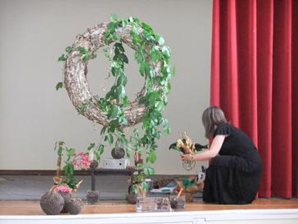 Placing the Orchid on wreath