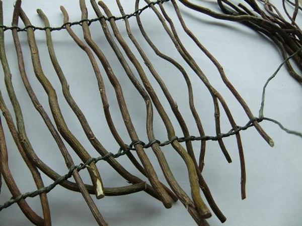 Weaving with copper wire on weaving sticks