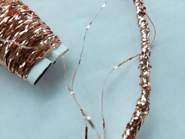 Cover the band with copper wire