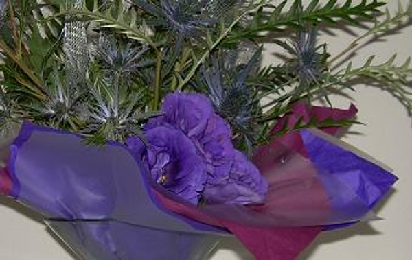 Lining a container with tissue paper and cellophane