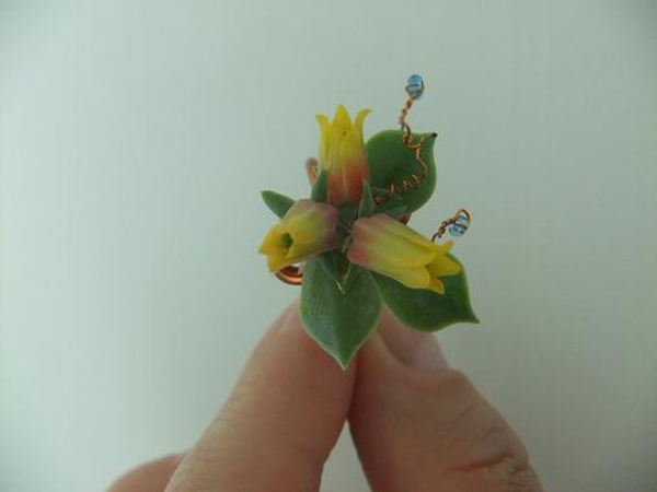 Ring made of copper wire and plant material Ring made of copper wire and plant material