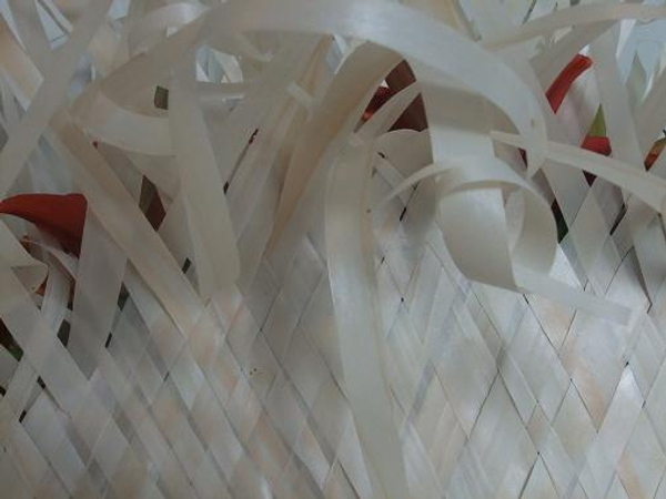 Weave pattern and random knots in strips of Kyogi paper