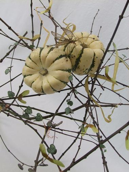 Rosary vine and pumpkin floral art design