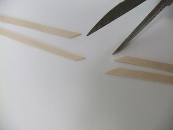 Cut wooden sticks at a sharp angle