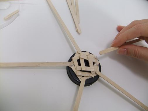 Glue on 5 wooden peg supports for the floral parasol
