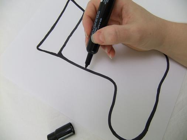 Draw the Christmas stocking shape on paper Draw the Christmas stocking shape on paper