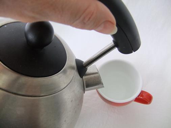 Pour boiling water into a cup