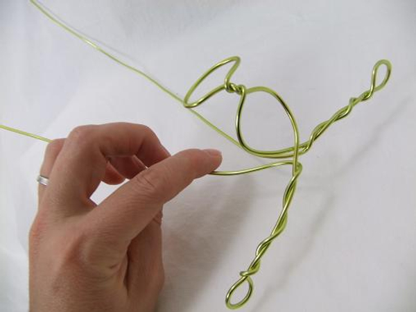 Twist the wire to create the arms