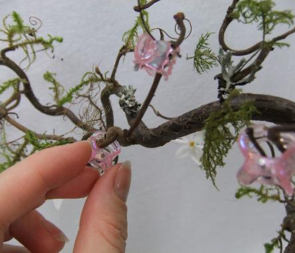 Butterfly hairclip claws to hold twigs in place while glue dries