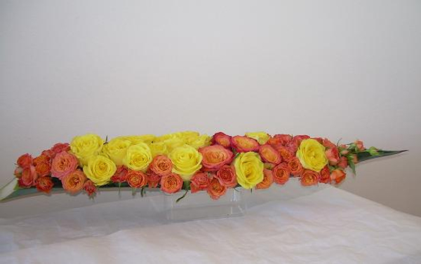 Floral Art Design using roses and Agave sisalana (sisal) boat.
