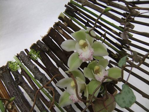 Wired twigs radiate out to make a basket handbag