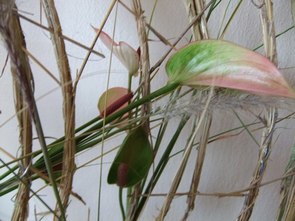 Inventive Floral Art mechanics made of wire and grass coils.