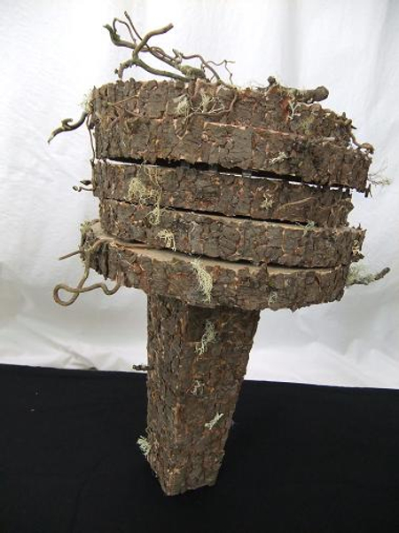 Cover cardboard and metal shapes to create a natural looking armature.