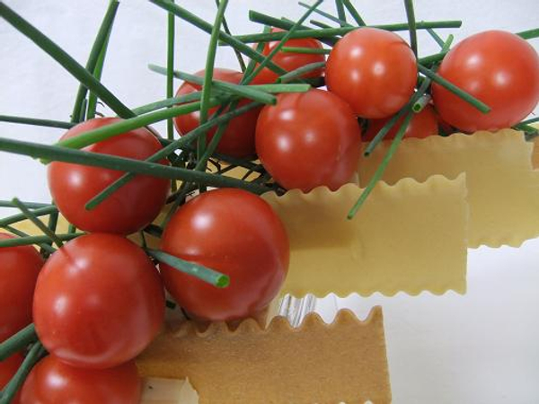 Vine tomatoes, lasagne and chive centerpiece.