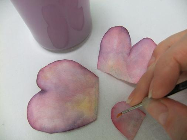 Paint the coffee filter petals with water colour paint