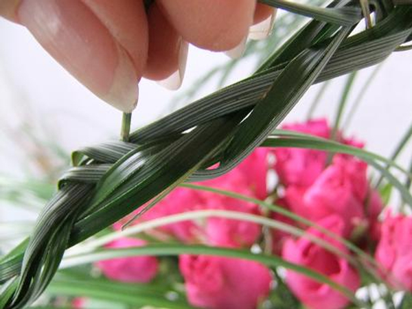 Tidy up the braid by weaving any loose strand in on itself.