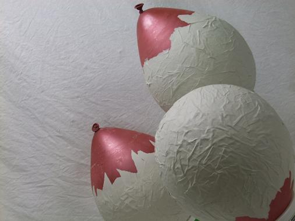 Turn the Papier Mache Easter eggs to make sure it dries.