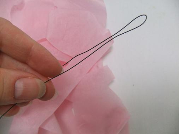 Fold a wire into a hair pin hook.