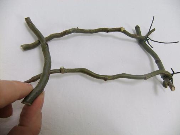 Use four twigs to build two side panels.