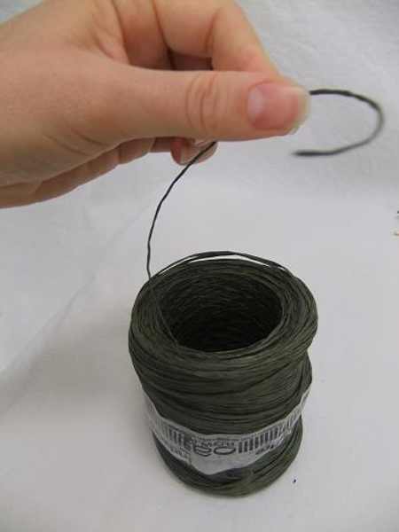 Using bind wire.