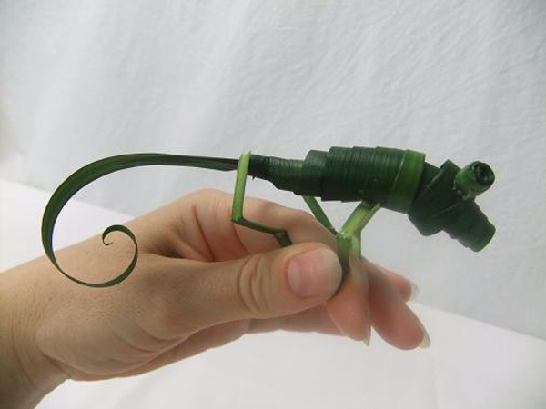 Glue the legs to the Guacamole Green Coiled Grass Chameleon.