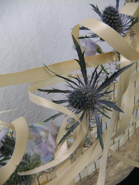 Delphinium, Sea holly and Kyogi paper curls. Delphinium, Sea holly and Kyogi paper curls.