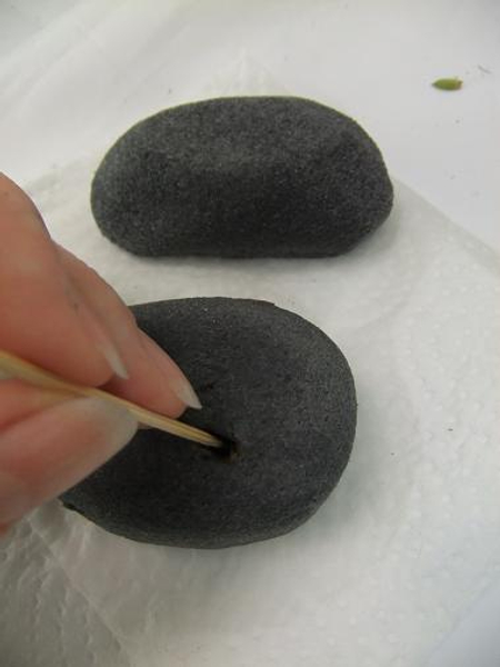 Make a small hole in the Oasis Rainbow foam pebble. 