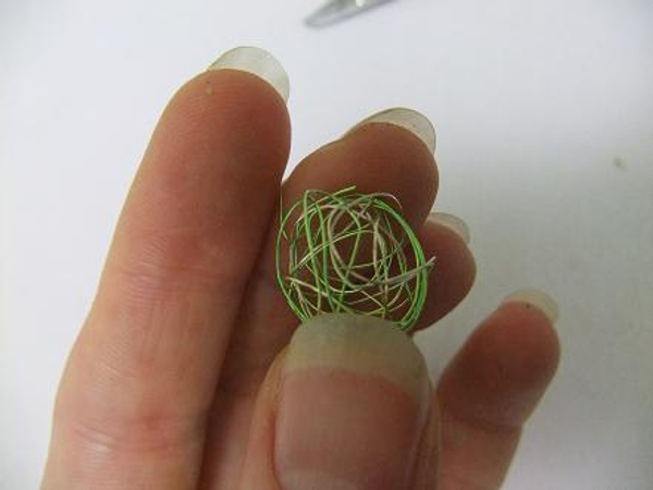 Roll the wire into a ball.