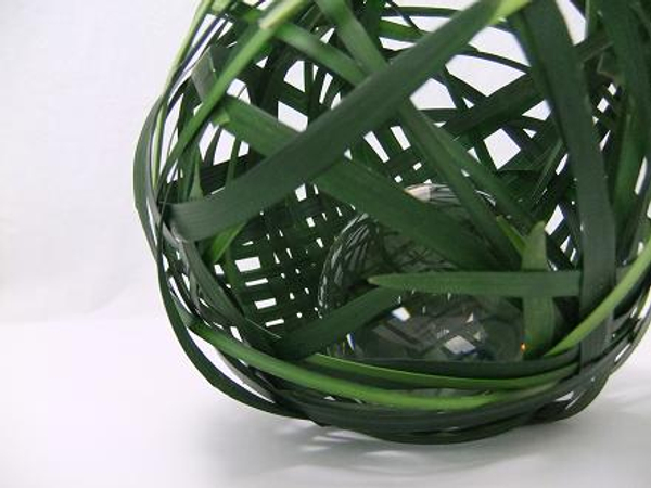 Glass sphere in a grass sphere.