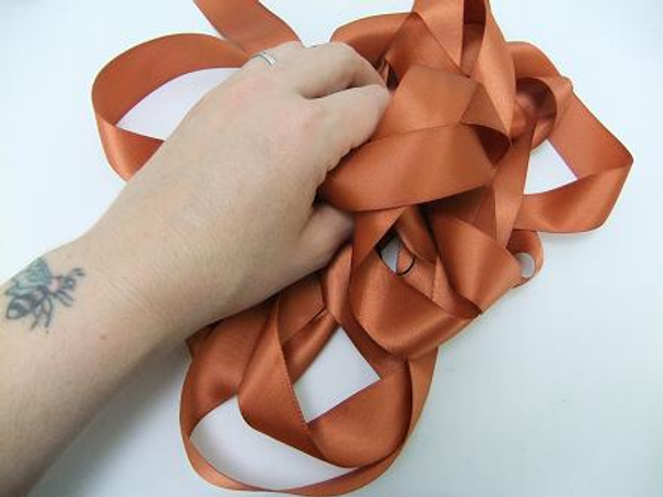 Neatly roll you ribbon to store flat in a drawer