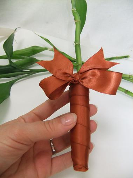 Wrap a test tube with ribbon.