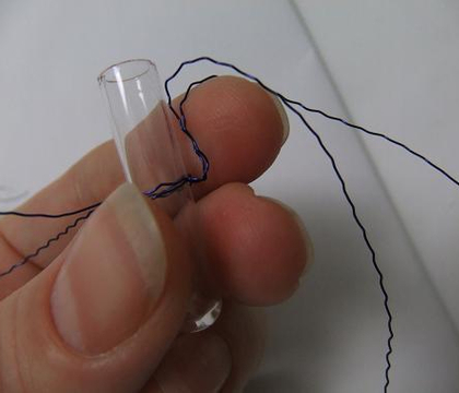 Wire spider legs for tiny glass test tubes