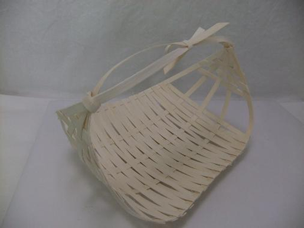 Midelino cane coil flat harvest basket.