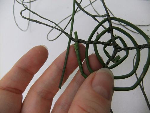 Twist a fresh stem with wire.