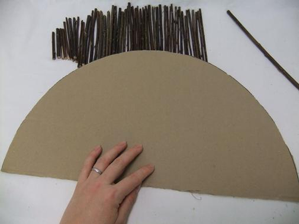 Use a cardboard half-moon as a template.