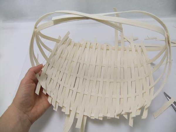 Weaving the entire base of the basket