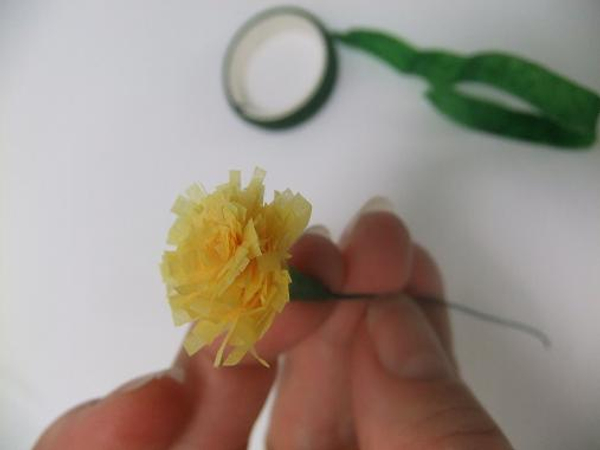 Yellow tissue paper disc florets.