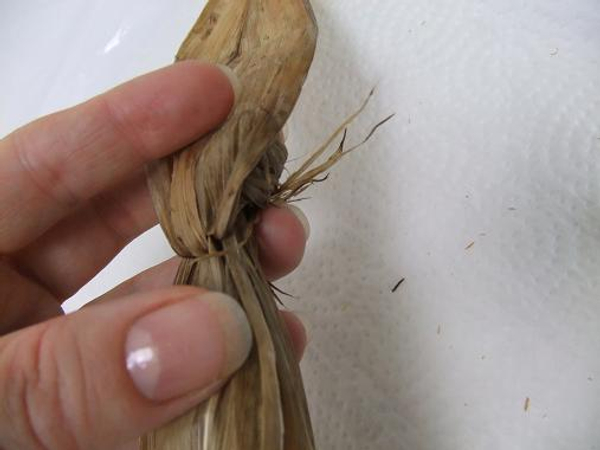 Roll the leave ends and fold the leaf over the ball.