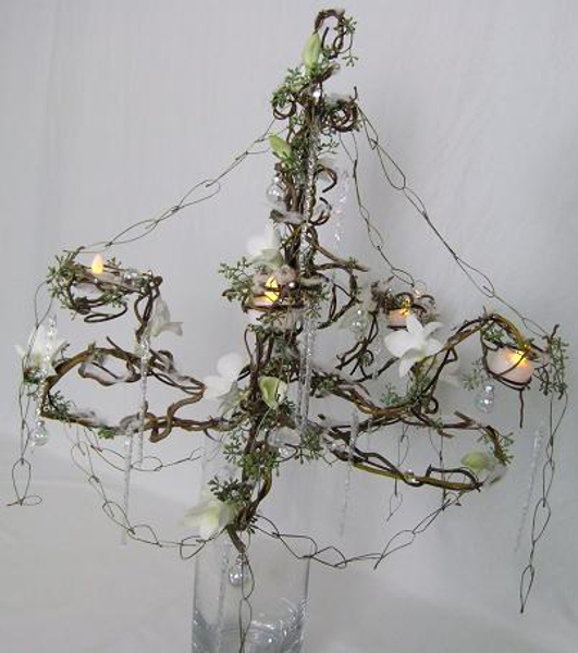The glories of Christmases long, long ago Floral art Chandelier design. The glories of Christmases long, long ago Floral art Chandelier design.