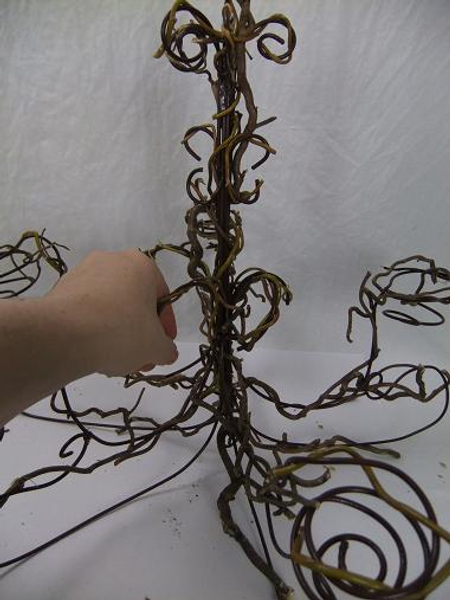 Use longer willow twigs to secure the other twigs
