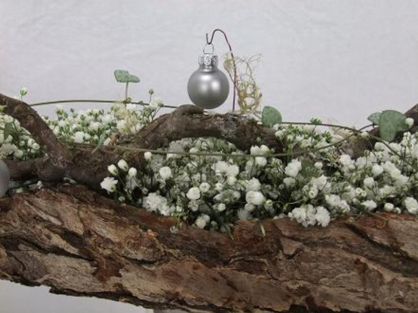 Baby’s breath, bark, hazel and rosary vine winter Christmas