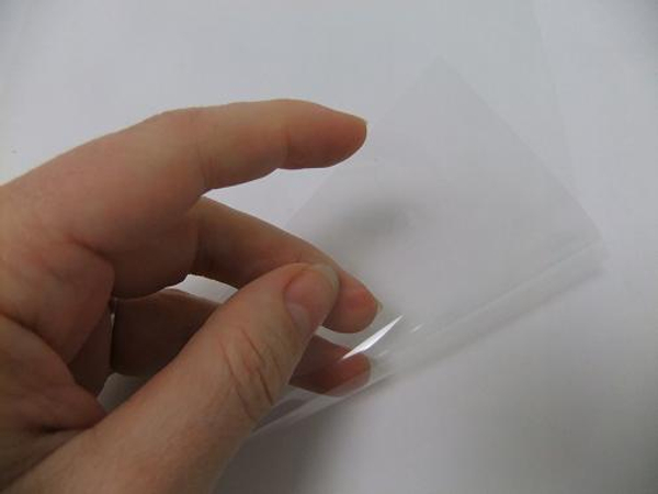 Place a sheet of plastic on a flat working surface