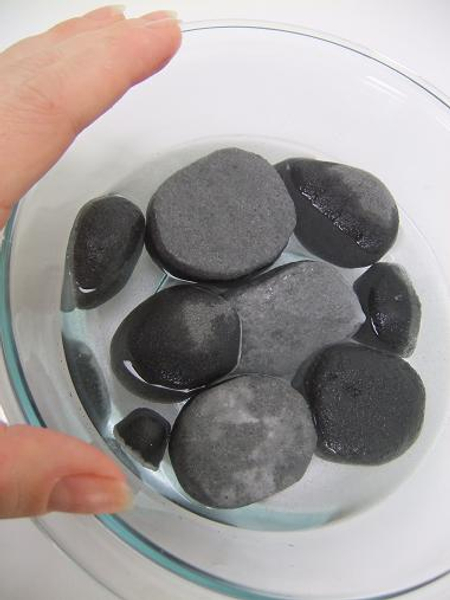 Float the floral foam pebbles on water