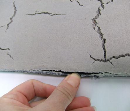 Casting wet cement to have surface cracks