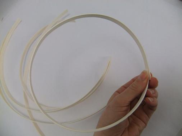 Cut the cane coils into sections and glue it into a circle