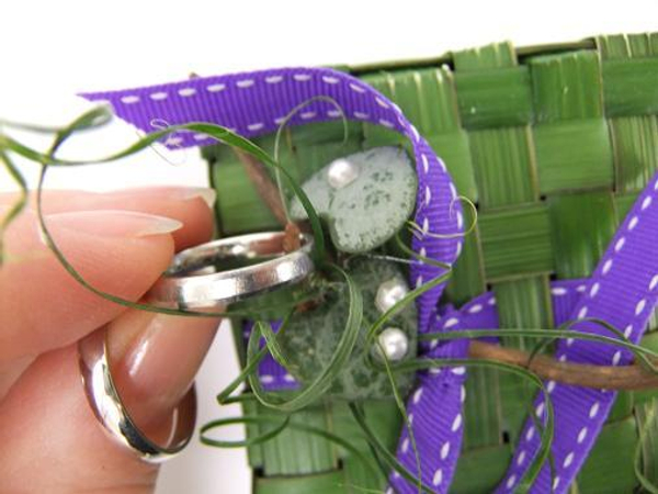 Decorate the woven cube ring box with succulents, twigs, beads and add the wedding rings