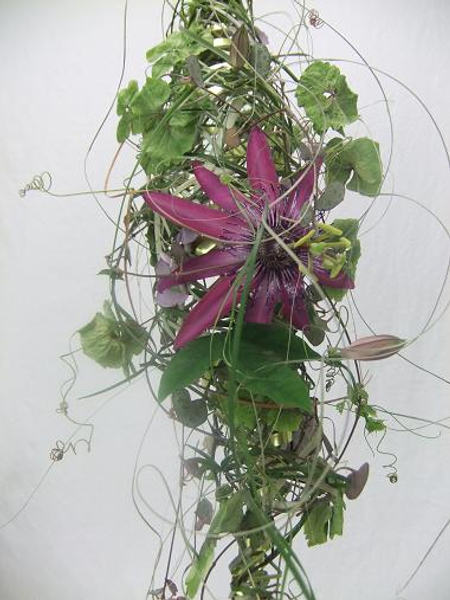 Add green and purple dried hydrangea flowers.