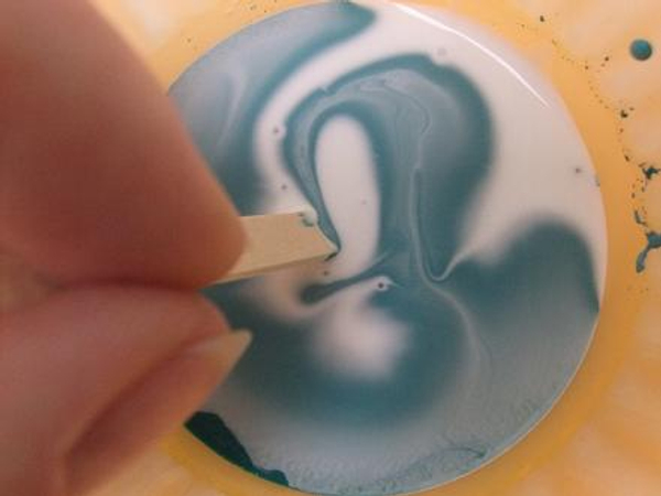 Mix water based paint into wood glue.
